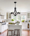 Farmhouse 5-Light Chandelier Pendant Light In Black Finish With Clear Glass Shades in bright kitchen setting