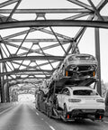 Auto hauler using Beefed Up Auto Hauler Tie Down Straps With Rolling Idler on bridge, vehicles secured, PRO Series, Heavy Duty Kit