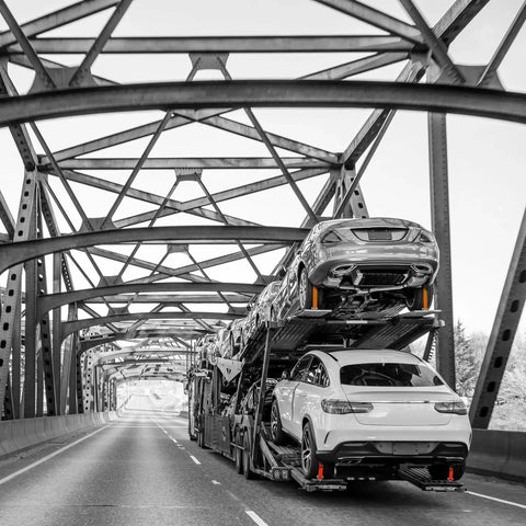 Auto hauler using Beefed Up Auto Hauler Tie Down Straps With Rolling Idler on bridge, vehicles secured, PRO Series, Heavy Duty Kit