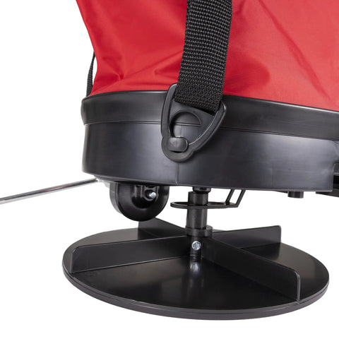 Close-up of 2750 25lb Nylon Bag Seeder And Spreader With Cross Shoulder Strap, Red Precise Placement Disk and Spring Shutoff.