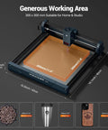 12W Laser Engraver with 300x300mm Work Area showing engraving examples on various materials