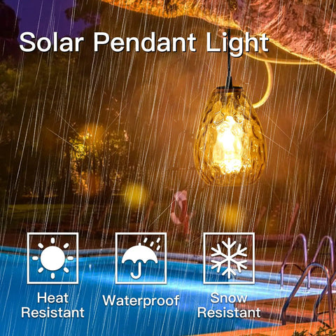 Lit Solar Pendant Lights With Amber Hammered Glass Shade And Edison Bulb Vibe glowing during rain by a pool, heat and snow resistant.
