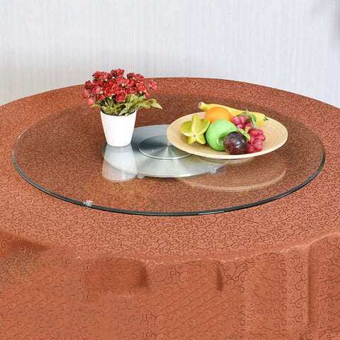 Rotating Lazy Susan Turntable for Kitchen and Dining Table with Tempered Glass 360 Degree Revolving Serving Tray holding fruit and flowers