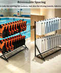 Keep Your Poolside Gear Slick And Stored With This Heavy Duty Metal Life Vest Rack Serving As A Large Equipment Organizer Featuring Roll Wheels For Fast Drying Access, holding life vests and towels.
