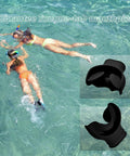 Black silicone mouthpiece with regulator ties for scuba snorkeling shown with swimmers in ocean