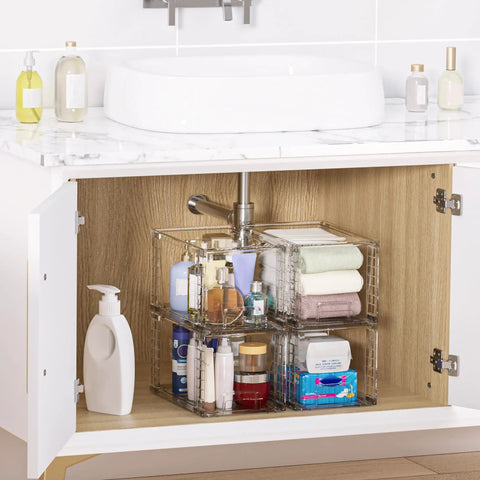 Four Pack Large Clear Stackable Storage Drawers With Smooth Pull Out Slides And Grippy Silicone Pads For Super Neat Closets That Keep Your Belongings Squared Away Daily organized under a sink with beauty products.