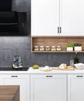 Modern kitchen with white cabinets featuring Matte Black 25 Pack Cabinet Handles 3 Inch Hole Centers 5 Inch Overall Length Square Base Drawer Pulls.