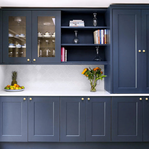 Heavy Gauge Brushed Brass Cabinet Knobs 5 Pack Featuring Smooth Round Edges and Top Shelf Solid Build on kitchen cabinets.