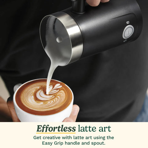Hot And Cold Foam Milk Frother For Coffee And Cafe Style Drinks Like Lattes Cappuccinos Macchiatos And Hot Chocolate With Stainless Steel Nonstick Milk Tank And Cool Touch Exterior pouring milk over latte