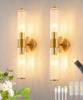 Solid Gold Battery Operated Wall Sconces Set Of Two Dimmable Rechargeable with glass shade, mounted on a wall.