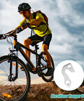 Cyclist on mountain trail with close-up of Aluminum Alloy Rear Derailleur Hanger 94 for Mountain Bikes Durable Tail Hook