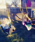 Two children playing on 2 Pack Heavy Duty Kids Swing Seat Set With 66 Inch Chain Plastic Coated For Outdoor Playground Replacement Includes Safety Snap Hooks And EVA Seats That Supports Up To 250 Lbs Backyard Ready.