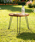 Built Different 16.5 Inch Folding Hairpin Table Legs Set Of 3 Solid Steel Frame Sleek Black Finish Non Slip Floor Caps in a garden setting.
