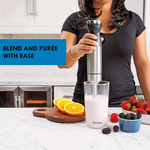 Badass Handheld Immersion Blender With Turbo Pulse Power And Four Rock Solid Stainless Blades, Includes Quick Snap Chopper Bowl And Wire Whisk To Crush Blending Jobs Without Breaking A Sweat in use blending a smoothie