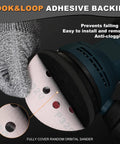 Close-up of 5 inch 8 hole hook and loop sanding disc focusing on hook and loop adhesive backing on random orbital sander.