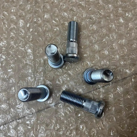 Premium 48mm Knurl M12x1.5 Lug Wheel Studs Kit For Honda Civic Acura CL Accord 1998-2021 Durable Car Bolts Upgrade Your Ride With Super Tight Fit and Reliable Performance Today. close-up of five knurled wheel studs on bubble wrap