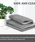 Super Chill Non Slip Shower Mat With Quick Dry Drain Holes And Sticky Traction Phthalate Free PVC Bathroom Must Have Quick Drying Loofah Texture Grey 24X16 Inches Plus Drain folded with plant background.