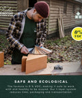 Person inspecting wood samples with DuroGrit Outdoor Wood Oil Stain And Sealer In Foxy Brown One Layer UV Protection for use. Safe and ecological.