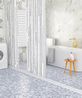 Heavy Duty 3 Inch Rise Shower Threshold Water Dam Adhesive Leak Blocker Guards Bathrooms Slaps Down For Quick Fixes Keeps Floors Bone Dry Peels And Sticks 74 Inch Long White Vinyl in a modern bathroom with gray and white tiles.