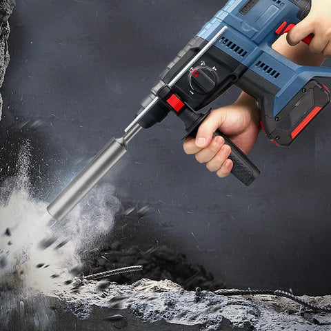 Heavy Duty Ground Rod Driver for Five Eighths to Three Quarters Inch Rods attached to hammer drill in action.