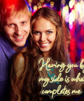 Having You By My Side Is What Completes Me neon sign in warm white light at a lively party background, perfect for events and decor.