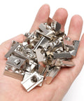 Hand holding M8 Thread T Slot Nut With Ball Spring Roll In for European Standard 40 Series Aluminum Extrusion, 50 Pack