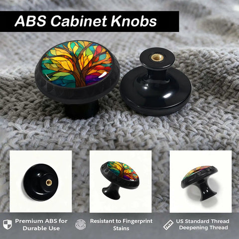 Stained Glass Tree Of Life Cabinet Knobs, 12 Pack on textured fabric, colorful design, ABS and crystal glass, close-up view.