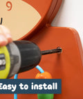 Person installing Horse Themed Activity Wall Panel With Two Interactive Activities For Toddlers using a power drill.