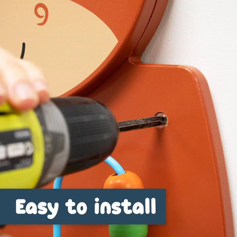 Person installing Horse Themed Activity Wall Panel With Two Interactive Activities For Toddlers using a power drill.