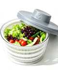 Massive 4L Electric Salad Spinner With Wireless Usb Charging Heavy Duty Veggie Dryer And Roomy Lettuce Bowl filled with fresh greens.