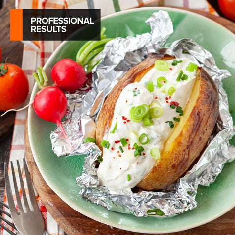 Baked potato topped with sour cream and chives wrapped in Pre Cut 12 Inch Heavy Duty Aluminum Foil Wraps 200 Count Pop Up Sheets.