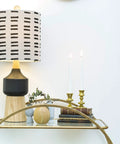 Natural Wood And Black Ceramic Table Lamp With Linen Mudcloth Shade, Rotary Switch, 60W Max on entryway console
