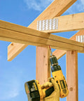 Heavy Duty Four And A Half Inch Truss Wood Screws Black Electrocoat Finish Build Tough For Interior Wall Framing and Roof Joists, drilling into timber.