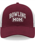 Front view of a maroon trucker cap with white mesh and 'Bowling Mom' text, suitable for sports and casual wear.