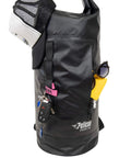 ExoDry 30L Large Drybag With Roll Top Closure Waterproof 500D PVC, showing pockets and backpack straps, with items stored inside the black bag.