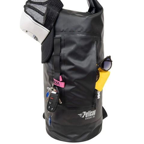 ExoDry 30L Large Drybag With Roll Top Closure Waterproof 500D PVC, showing pockets and backpack straps, with items stored inside the black bag.