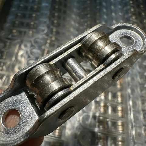 Heavy Duty Sliding Door Roller Set With Double Wheel Pulleys And Adjustable Balance Brackets showing close-up of double wheel pulleys.