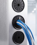 Check These 10 Pack Black Cable Grommets For Your Desk. Petalshaped Design Makes Wiring A Breeze With Secure Grip Locking Tabs To Save The Day And Keep Cords Safe From Damage While Styling Out Your Setup. black nylon cable grommets on brushed metal panel with blue and white wires
