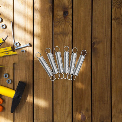 Heavy Duty 20 Pack Small Stainless Steel Tension Hook Springs For Ladder Feet And DIY Fixes With Serious Elasticity And Reliable Performance That Totally Save Your Skin On Repairs, shown on wood surface