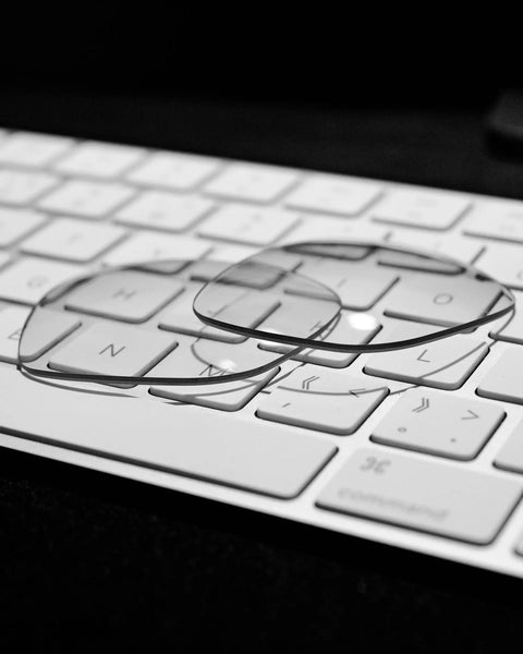 Replacement Lenses For Ray-Ban Meta Wayfarer RW4006 50mm AI Glasses High Intensity Clear Non Polarized Lens on a keyboard