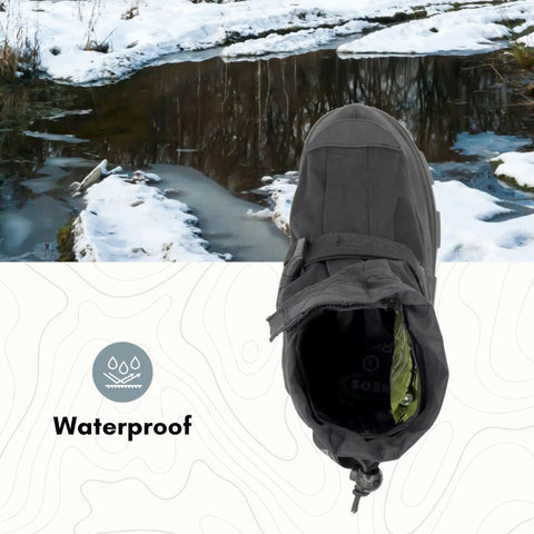 Badass Glacier Trekking Boots with Sweet Anti Slip Traction Spikes for Nasty Ice and Snow Waterproof Windproof 500 Denier Nylon Upper 32 Replaceable Cleats Keep Your Feet Safe from Slips on Gnarly Winter Surfaces Black Size 11 Includes Wrench, top view with snow background.
