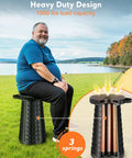 Heavy Duty Portable Collapsible Stool With Wide Seat, Extra Tall And Height Adjustable, used outdoors by a man, showing springs