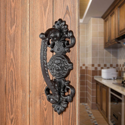 Heavy Duty 2 Pack 5.46 Inch Dark Brown Cast Iron Barn Door Handles Rustic Vintage Gate Fence Outdoor Garage Closet Cabinet Drawer Pulls Sturdy Rust Resistant Long Lasting With Retro Charm installed on a wooden door in a rustic kitchen setting.