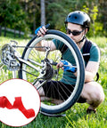 Cyclist repairing bike wheel with Two Pack 29 Inch Rim Tape For Road And Mountain Bikes, 13mm Wide, 0.5mm Thick, PVC Rim Strip Tape.