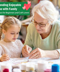 Grandmother and granddaughter using Upgraded Embroidery Stitch Book Kit With 106 Patterns, enjoying DIY embroidery together.