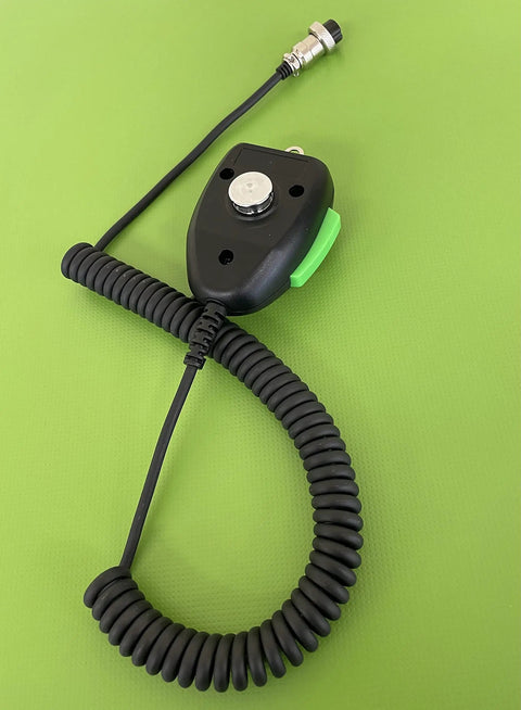 DIGIMIKE Microphone With Noise Reduction Circuit NRC for 6 Pin CB Radios and 10M Radios, coiled cord on green background.