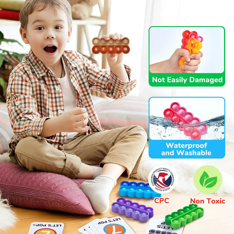 Child playing with Ten Frame Math Learning Kit with 24 ten frames and 20 task cards for ages 3-5. Colorful kid-friendly design.