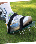 Adjustable Lawn Aerator Shoes Straps 8 Pack Heavy Duty Spiked Sandals for Garden Aeration in use on athletic shoe