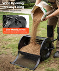 Person filling a Beefy Compost Spreader For Lawn Care And Garden, 16.5 Inch Wide Peat Moss Spreader With T Shaped Handle, 3 Adjustable Height Settings, Powder Coated Steel Roller with soil.