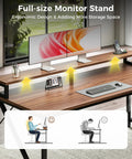 L Shaped Desk With Wood Drawers And Locking File Cabinet, 61 Inch Corner Office Desk With Power Outlet, LED Monitor Stand And CPU Stand, Under Desk Shelf Storage, Walnut Finish For A Boss Level Home Office Setup with a monitor on the stand